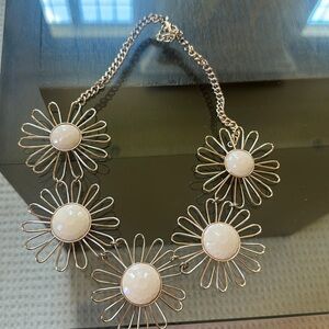 flower necklace with white gems plated in gold